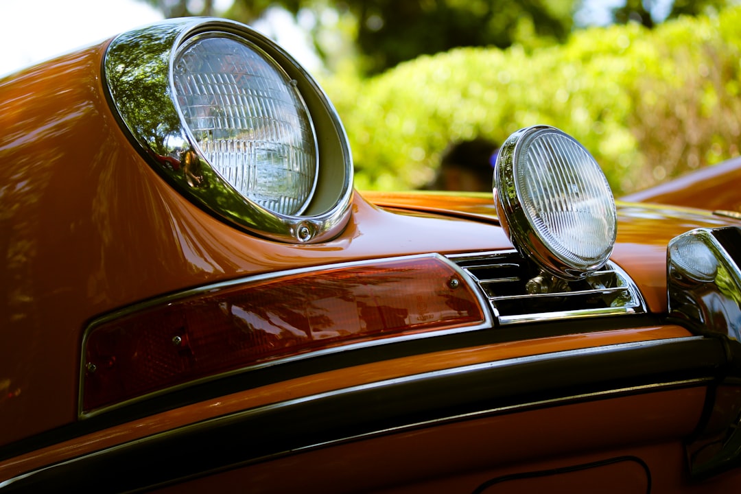 Jaguar E-Type convertible on coastal road